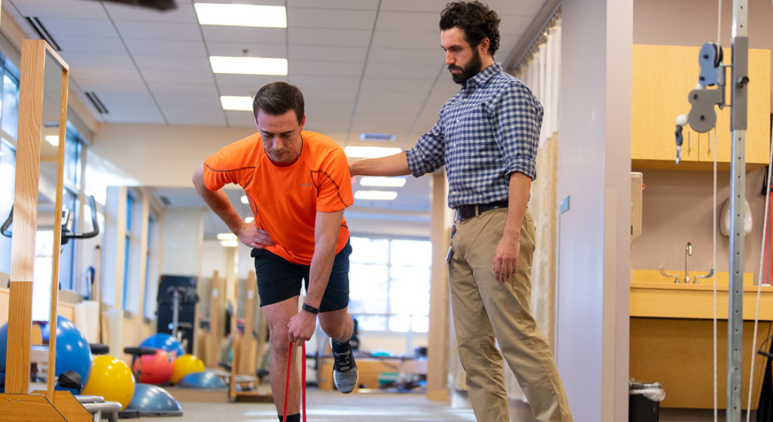 Physical Therapist with Patient