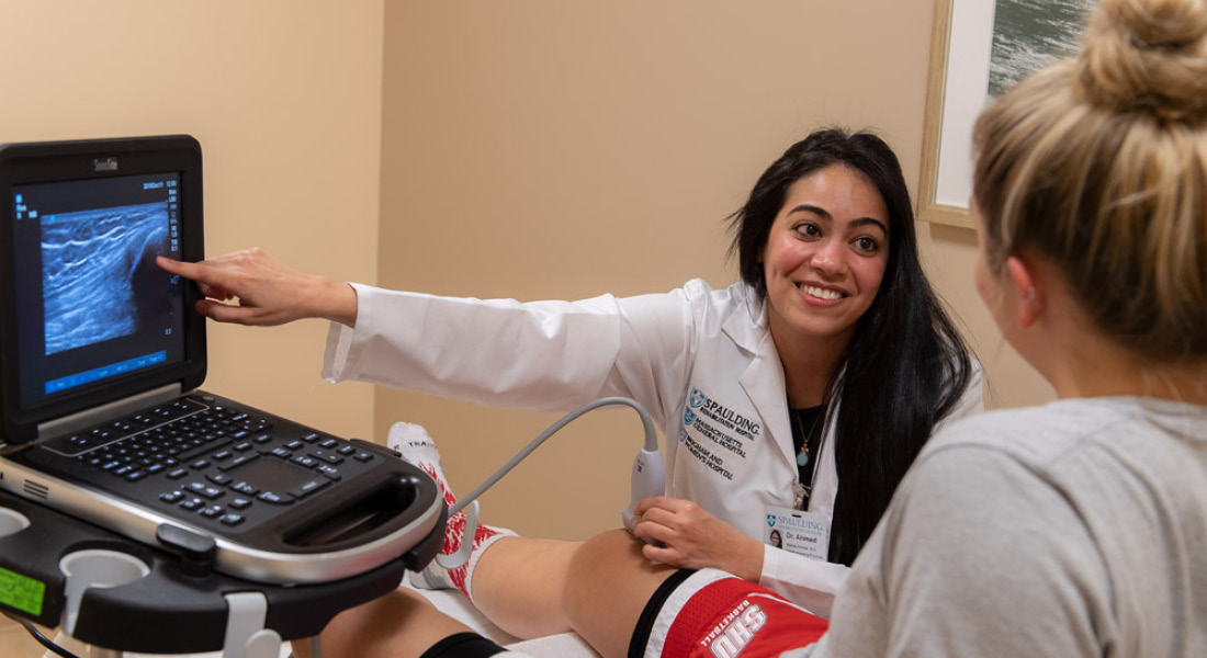 Doctor and patient reviewing ultraound