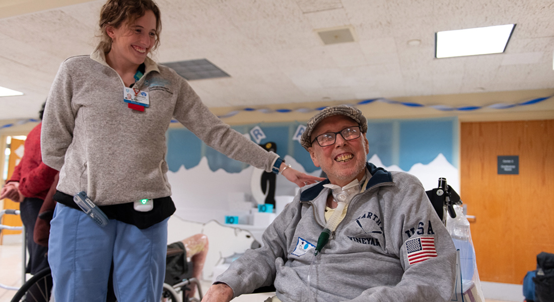 Nurse and patient smiling at Spaulding Hospital for Continuing Medical Care Cambridge
