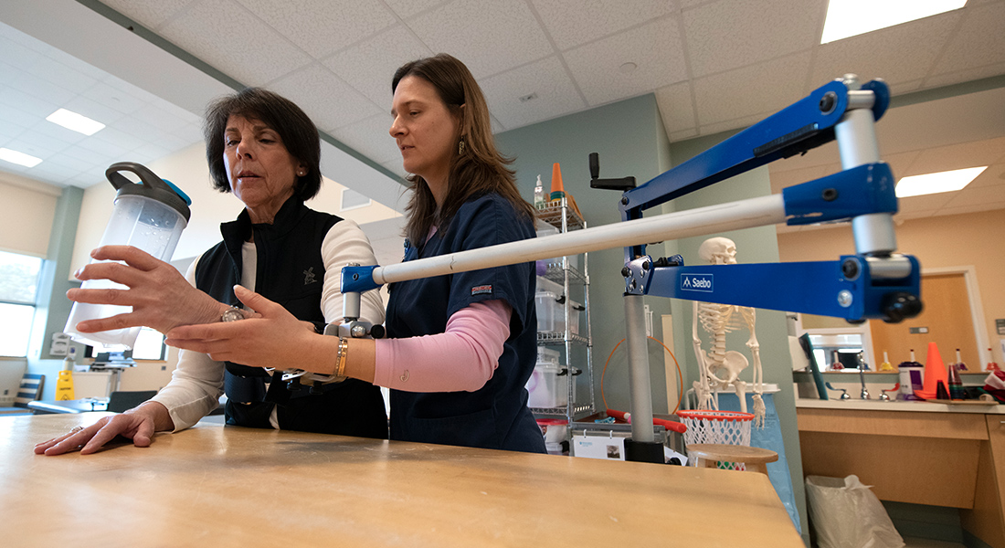 Patient rehabbing arm at Spaulding Rehabilitation Hospital Cape Cod