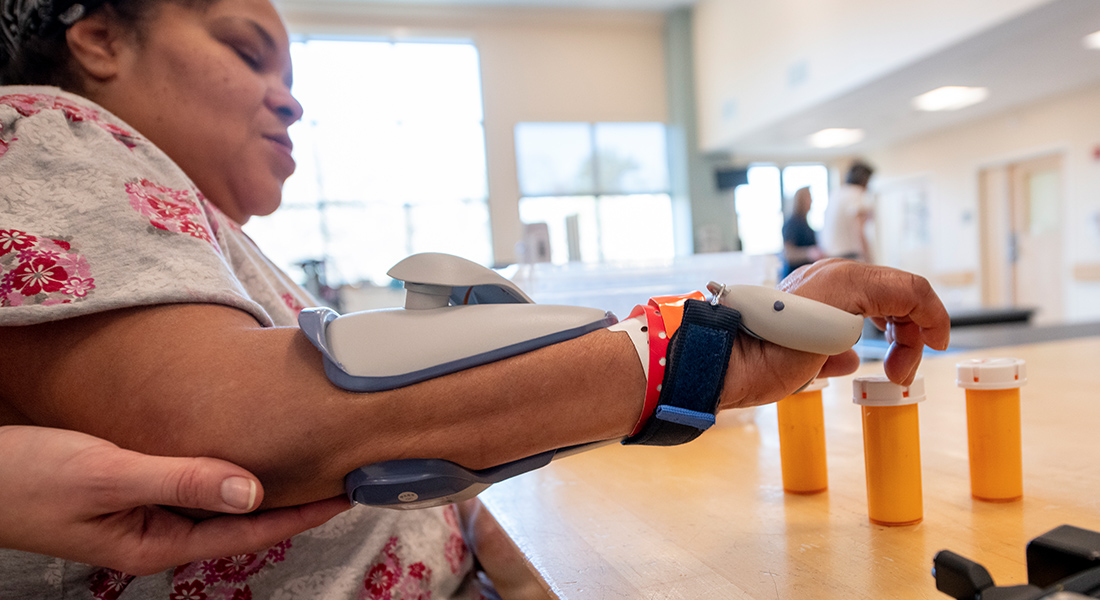 Patient rehabbing hand at Spaulding Rehabilitation Hospital Cape Cod