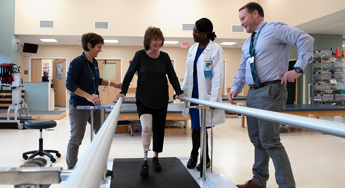 Patient with prosthetic leg rehabbing at Spaulding Rehabilitation Hospital Cape Cod