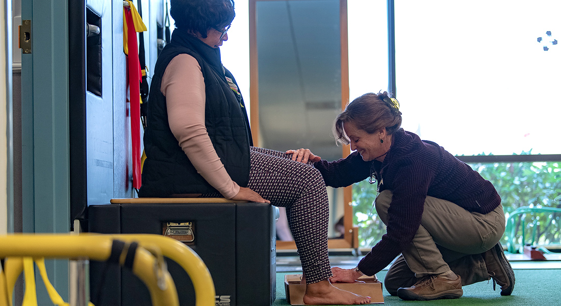 Physical therapist working with patient at Spaulding Outpatient Center Malden