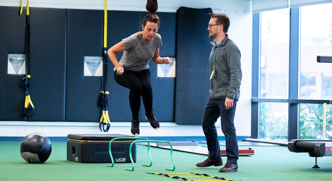 Patient rehabbing with physical therapist at Spaulding Outpatient Center Malden