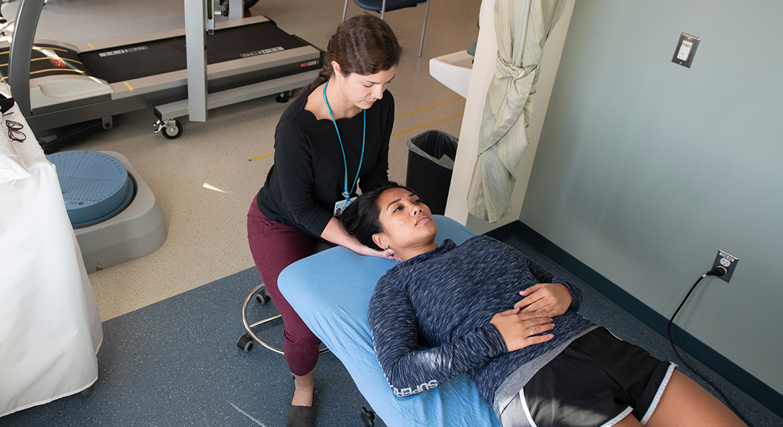 Physical therapist rehabbing patient at Spaulding Outpatient Center South Shore YMCA Quincy