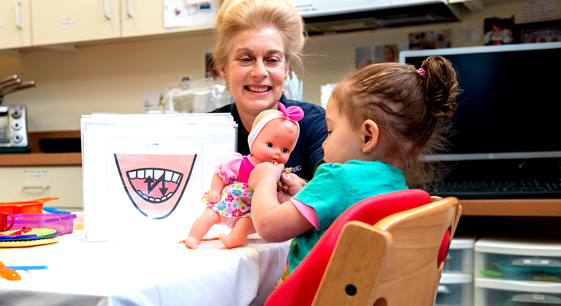 Employees and pediatric patients arts and crafts