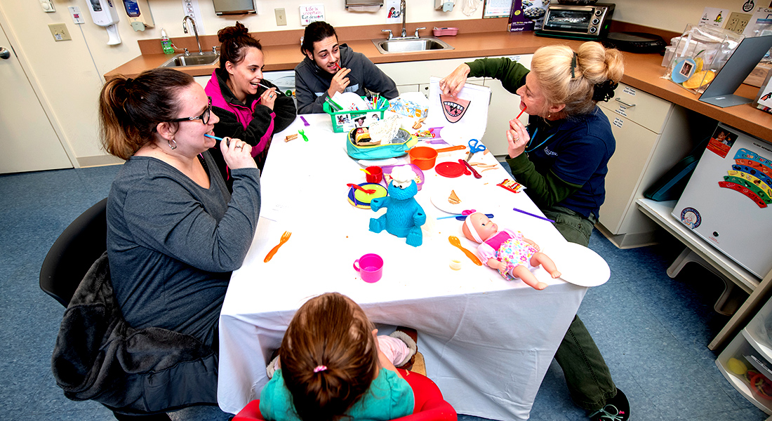 Employees and pediatric patients arts and crafts