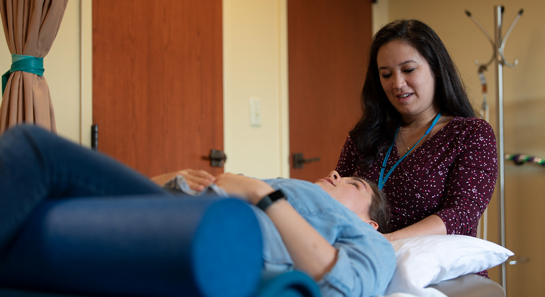 Physician assisting patient at Spaulding Outpatient Center Westborough