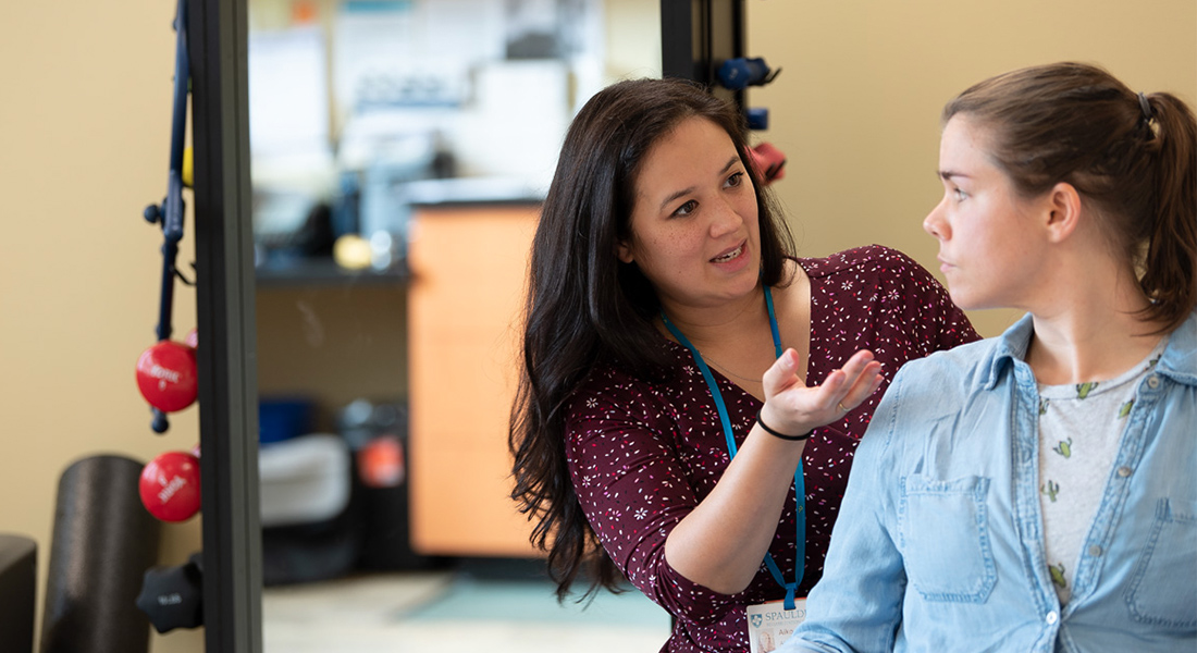 Physician assisting patient at Spaulding Outpatient Center Westborough