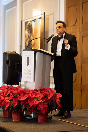 Ross Zafonte holds his 2023 Admiral Charles LeMoyne Distinguished Healthcare Professional Award