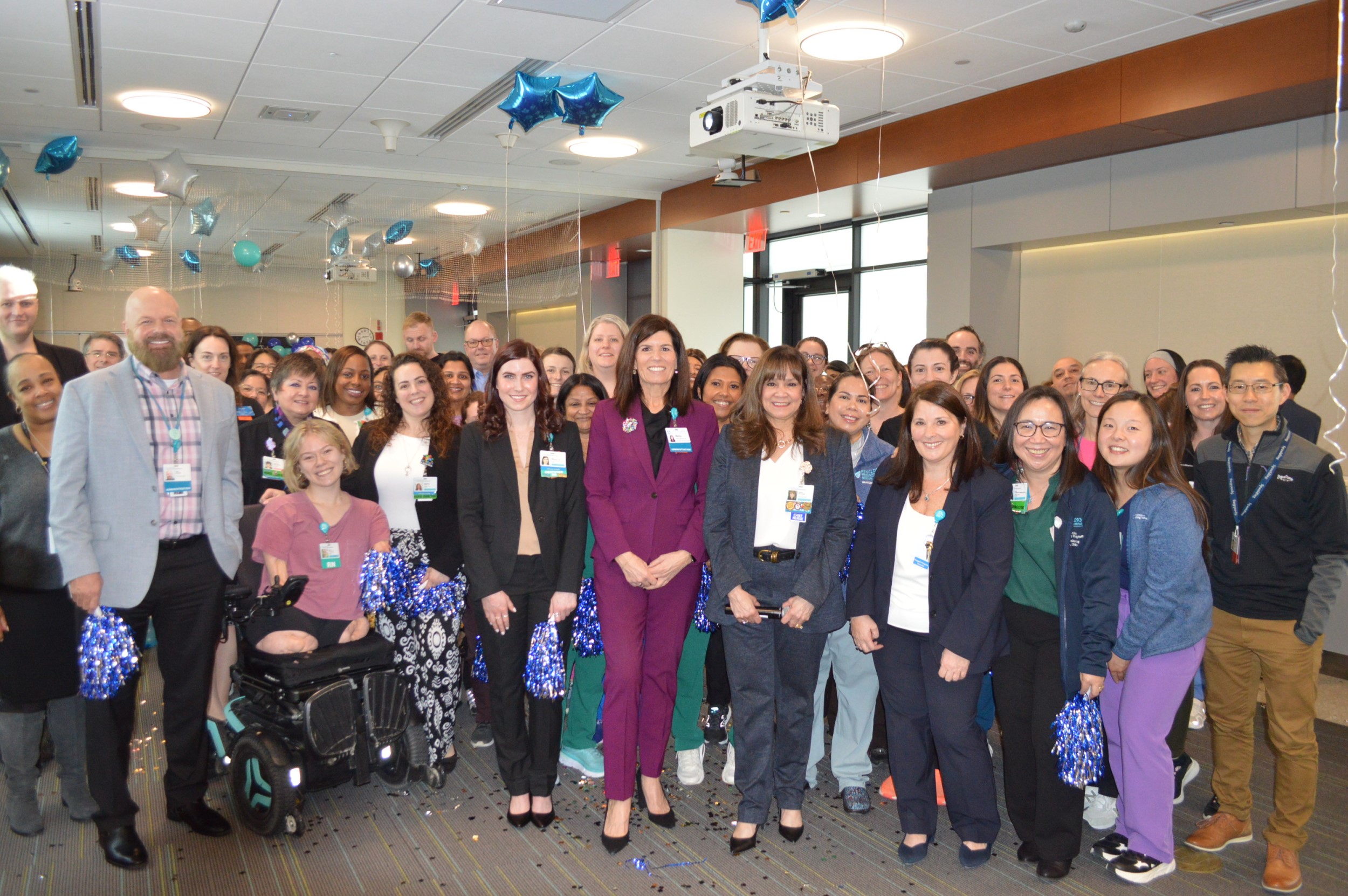 Group photo celebrating magnet status