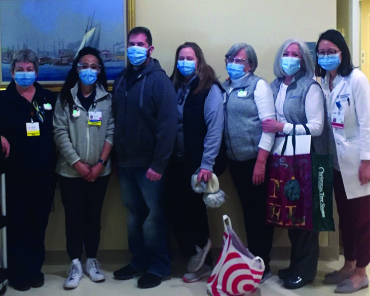 Alan and his care team pose together on the day Alan leaves the hospital.