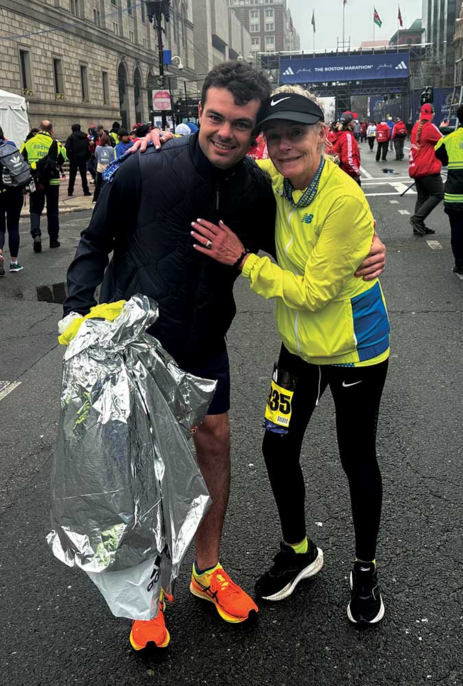 Dee and her son, Jack, in running clothes at the Boston Marathon.