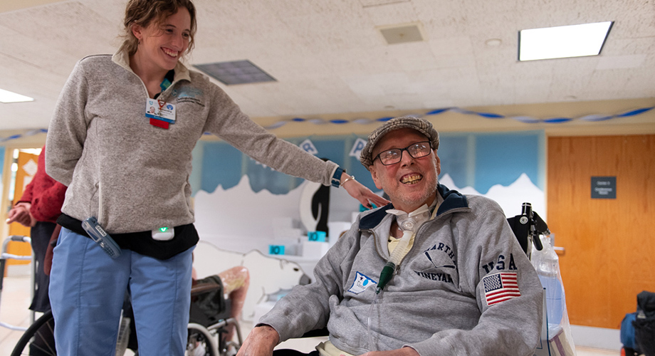 Donnie Shea smiling with Spaulding team member