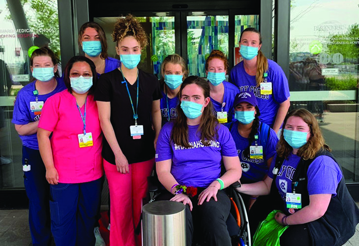 Hannah and her team pose outside the hospital.